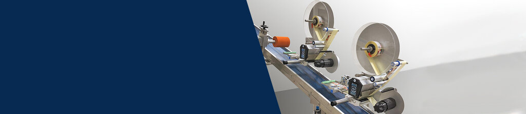 An industrial machine with two large rollers and a conveyor belt designed for the processing or transportation of materials.