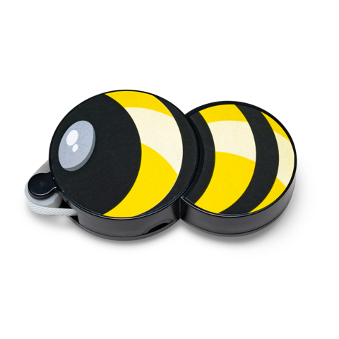 Runde, schwarz-gelbe Dose mit Bienenmotiv, die geöffnet ist und zwei Fächer zeigt.