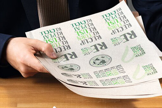 Printed natural brown labels on the desk.