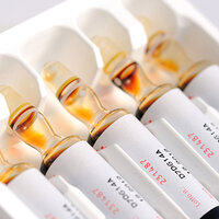 Vials with labeling stickers in the pharmaceutical sector