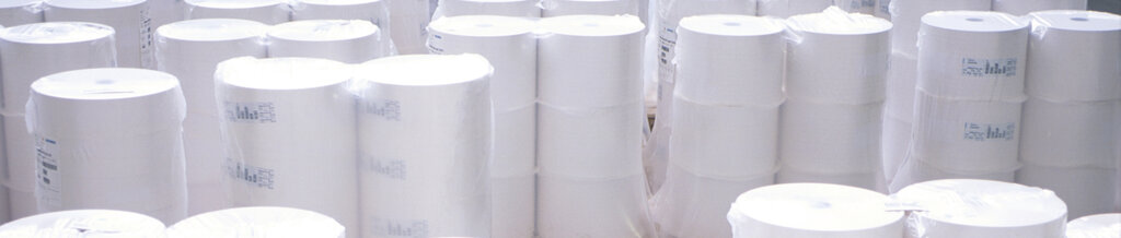 The translation of "Haftmaterial Rollen" is "Adhesive Material Rolls.