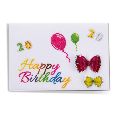 Eine Geburtstagskarte mit bunten Aufklebern, darunter ein Luftballon, die Zahl 20 und eine farbige Schrift, die "Happy Birthday" sagt.