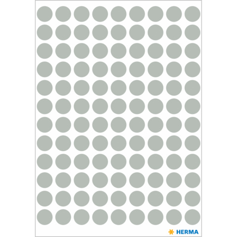 Ein Blatt mit mehreren gleichmäßig angeordneten grauen Punkten auf weißem Hintergrund.